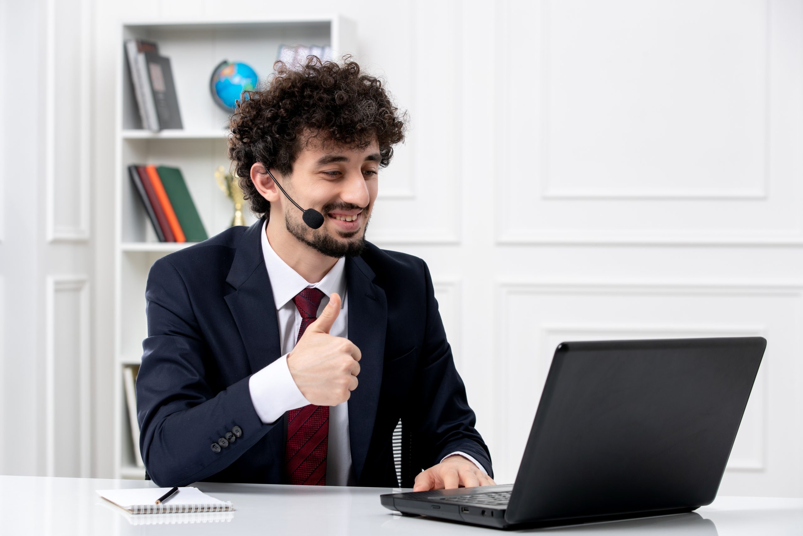 https://juarait.locx.in/wp-content/uploads/2024/03/customer-service-handsome-young-guy-office-suit-with-laptop-headset-smiling-happily-scaled.jpg